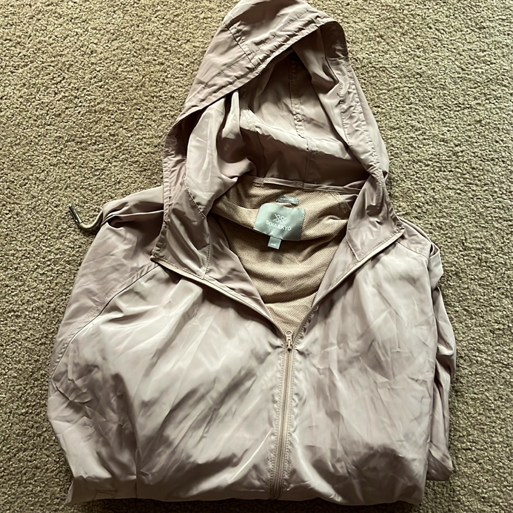 Lightweight Rain Jacket. Size L/XL.  New without tags. Soia&Kyo.